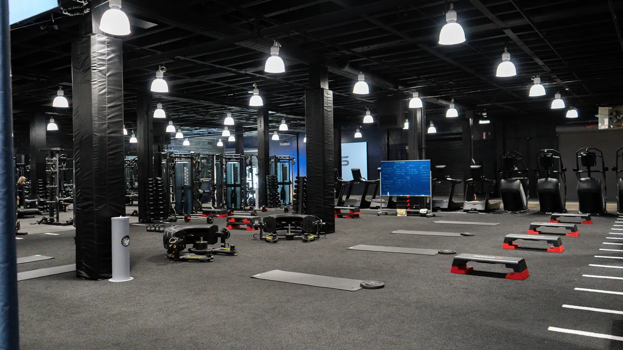 Open training floor with agility stations for youth athletes at DPS